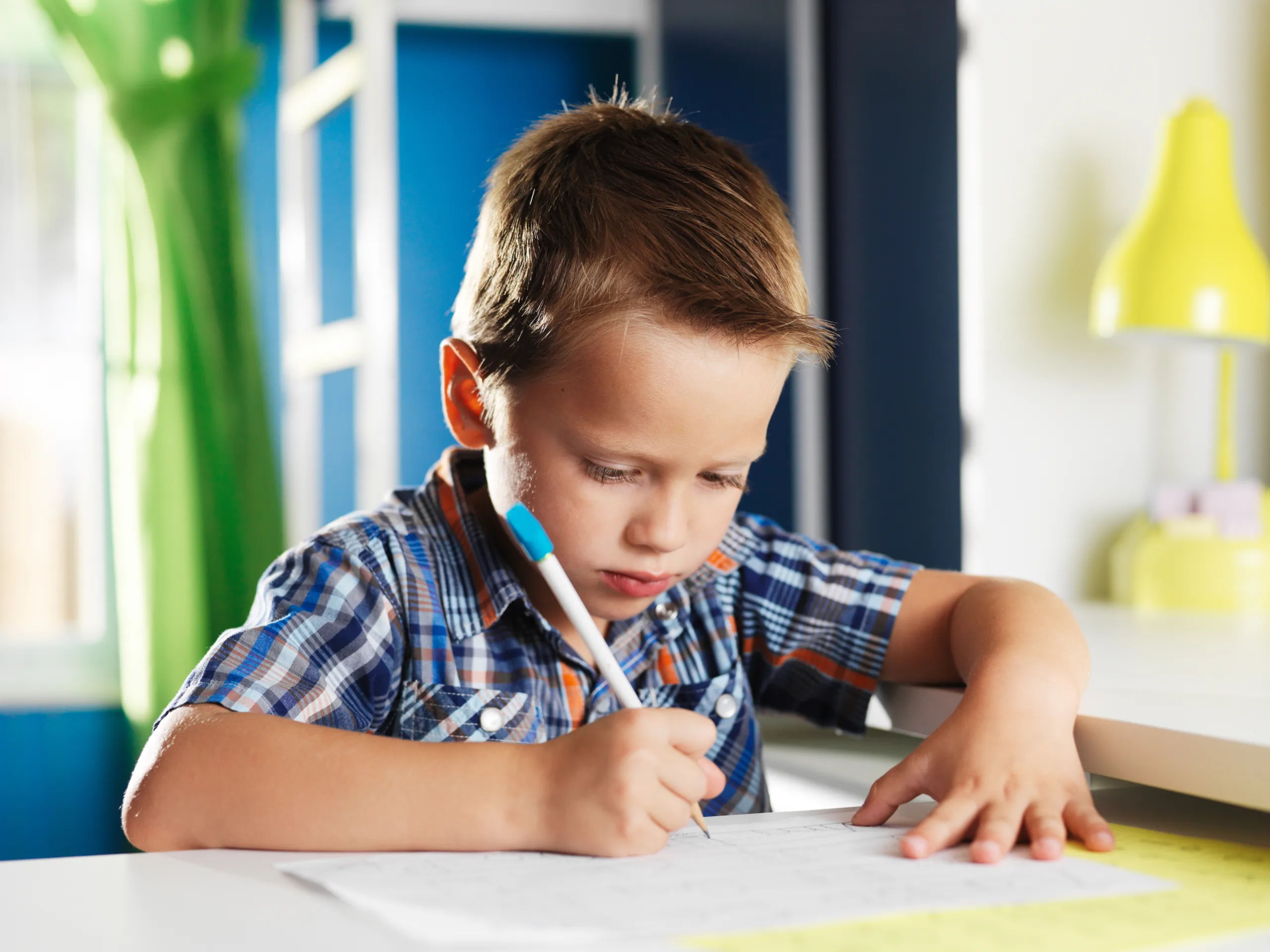 focused-child-writing-early-learning-classroom-childcare-surrey