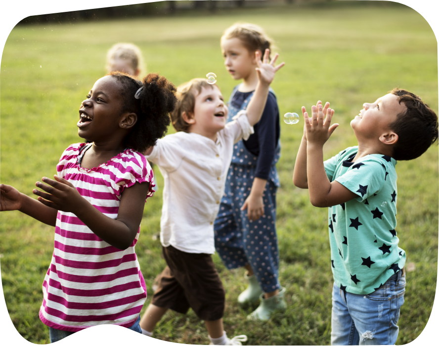 group-diverse-kids-playing-field-together