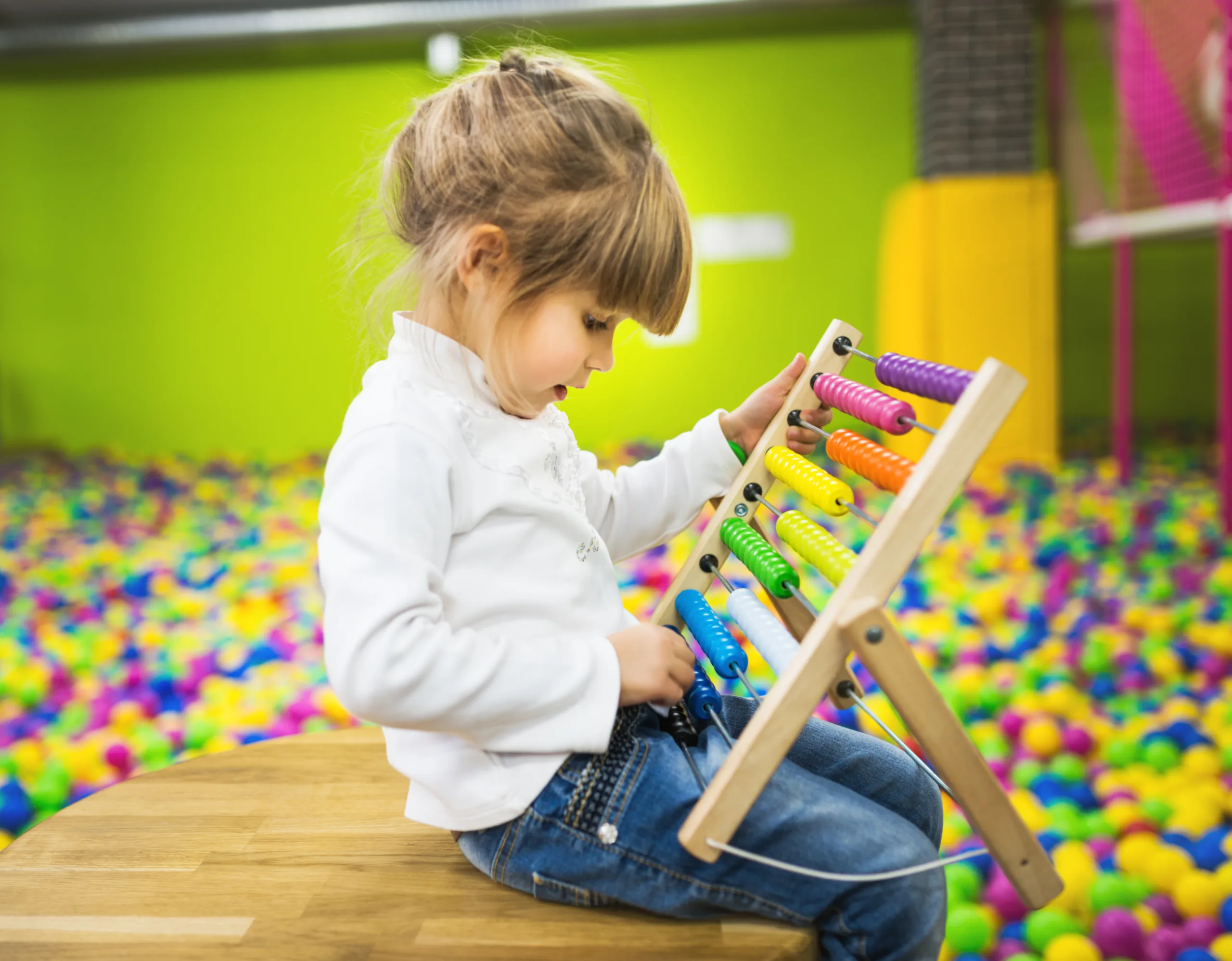 preschool-girl-educational-toy-brain-activity-childcare-surrey