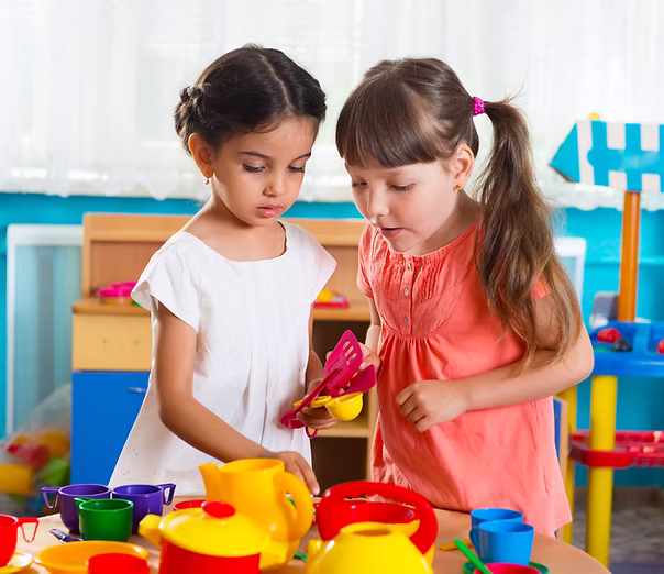 two-cute-little-girls-playing-role-game-
